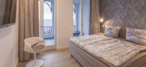 Schlafzimmer im Penthouse "270 Grad" mit Blick auf das Meer
